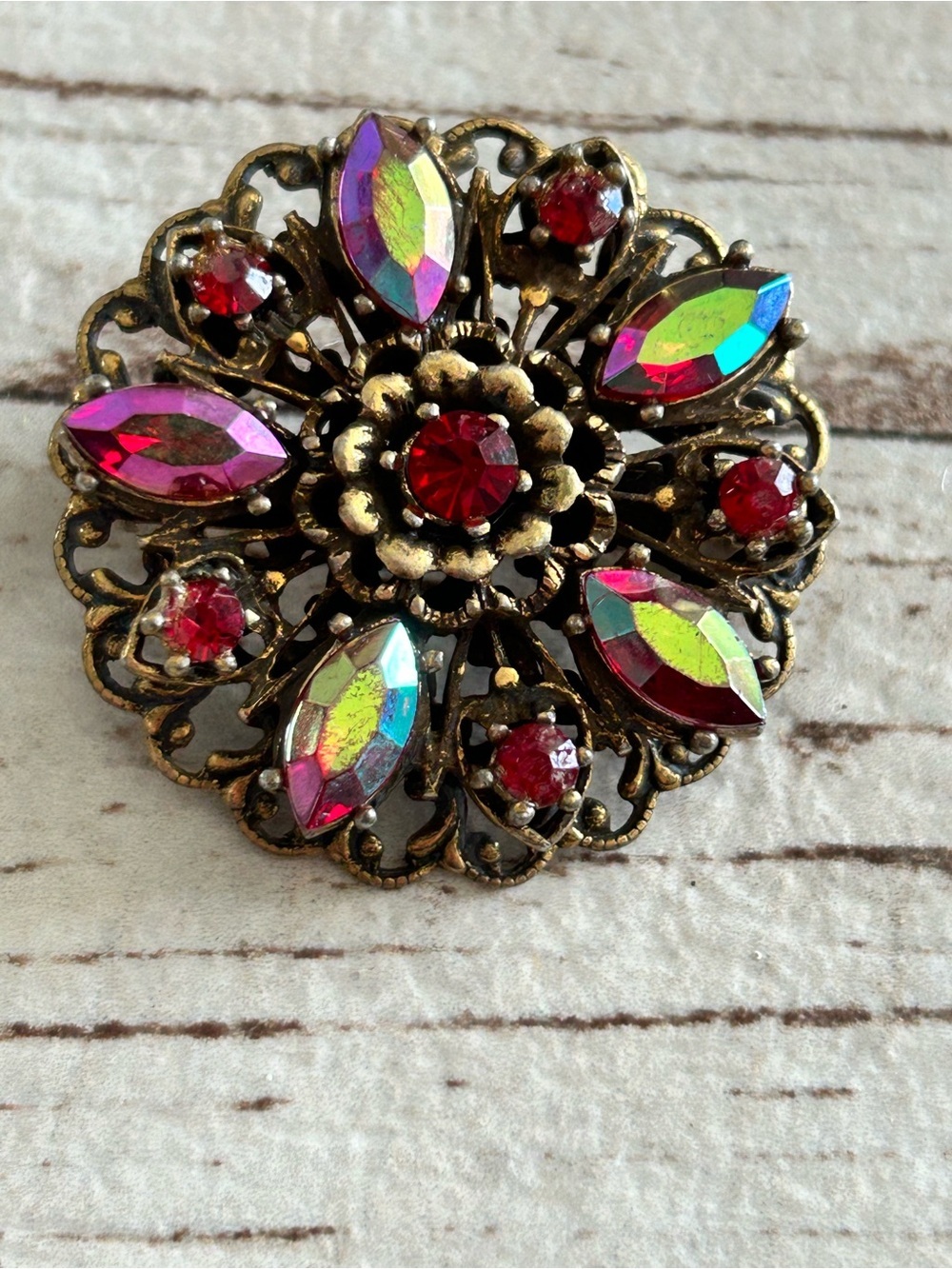 4/$100 Vintage-Inspired Gold Tone Brooch with Red and Iridescent Stones